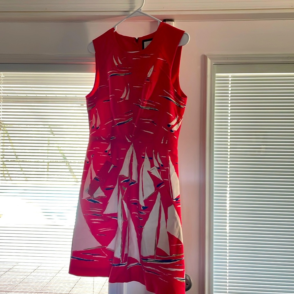 Cute summer dress with sailboats on it. Very nautical.